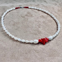 Pearls and coral choker.